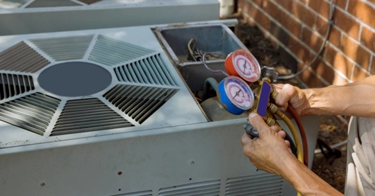 HVAC technician performing AC tune-up